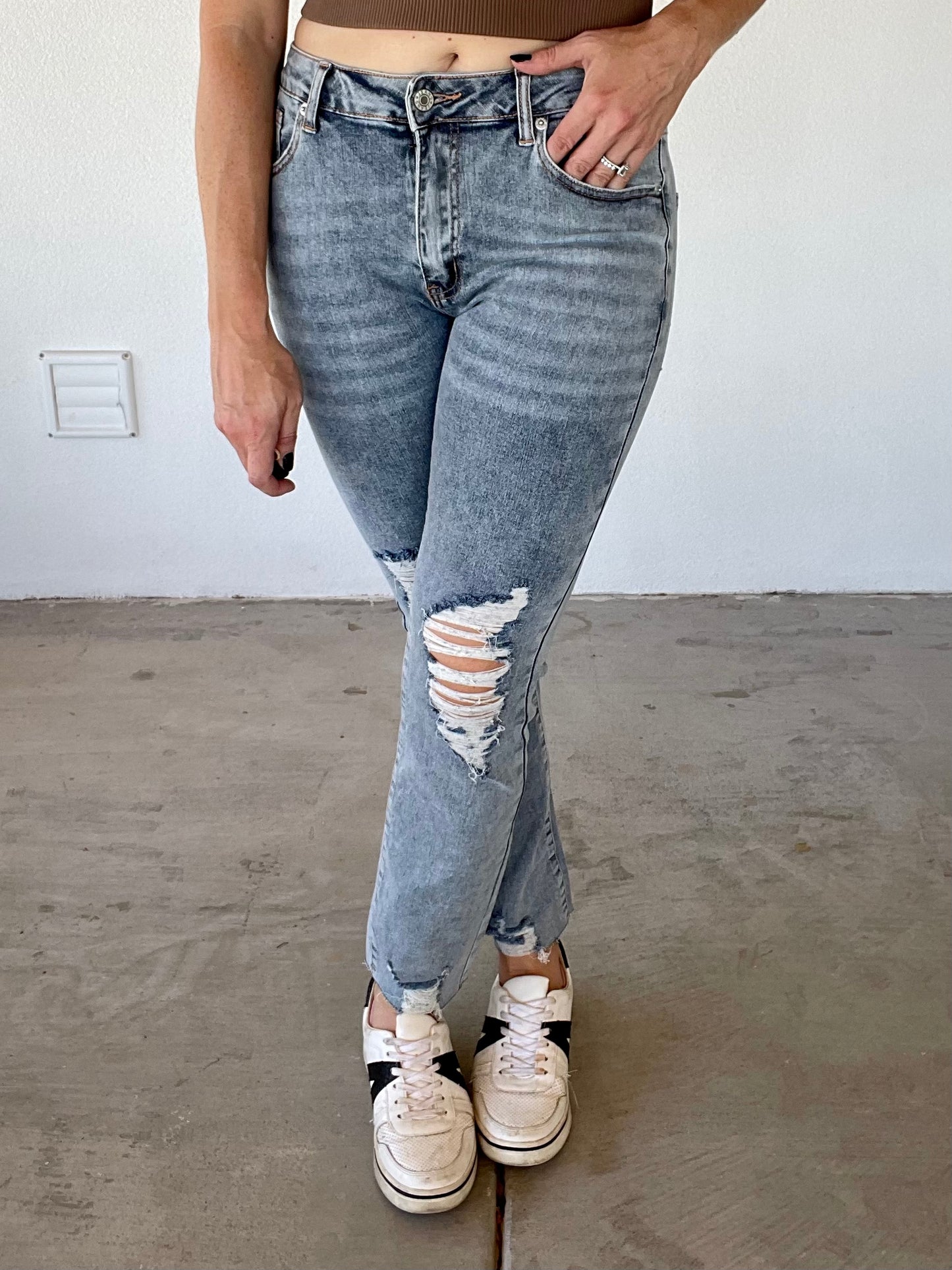 The Distressed Straight Leg Jeans